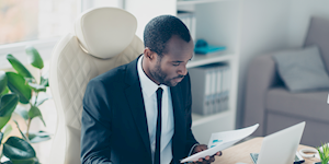 Man at desk with laptop