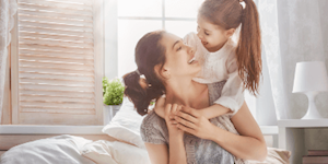 Daughter giving Mother a Hug